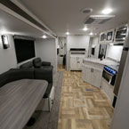 Interior Back to Front- U-Shaped Dinette, Sofa, Into Bedroom, Kitchen Galley.
