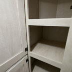 Top Door to Pantry Shown Open to Show Two Shelves.

